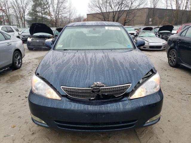 Photo 5 from auction – 2002 TOYOTA CAMRY LE with VIN 4T1BE30KX2U055916