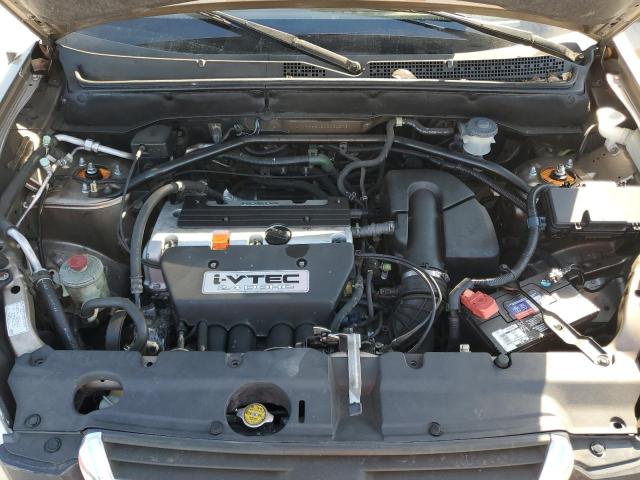 Photo 12 from auction – 2004 HONDA CR-V LX with VIN JHLRD68434C024306