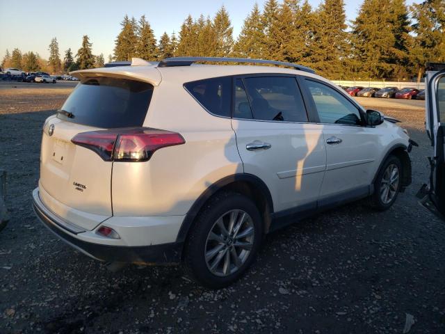 Photo 3 from auction – 2018 TOYOTA RAV4 LIMIT with VIN 2T3DFREV4JW735344