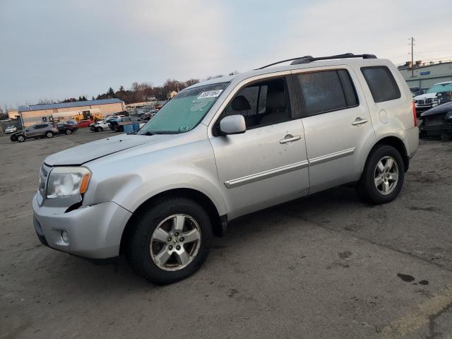 HONDA PILOT EXL 2011 with VIN 5FNYF4H59BB022561 - Photo from auction