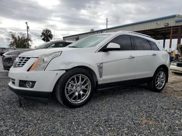 CADILLAC SRX PERFOR 2013 with VIN 3GYFNHE39DS569872 - Photo from auction