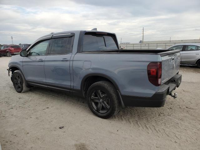 Photo 2 from auction – 2023 HONDA RIDGELINE with VIN 5FPYK3F8XPB036440