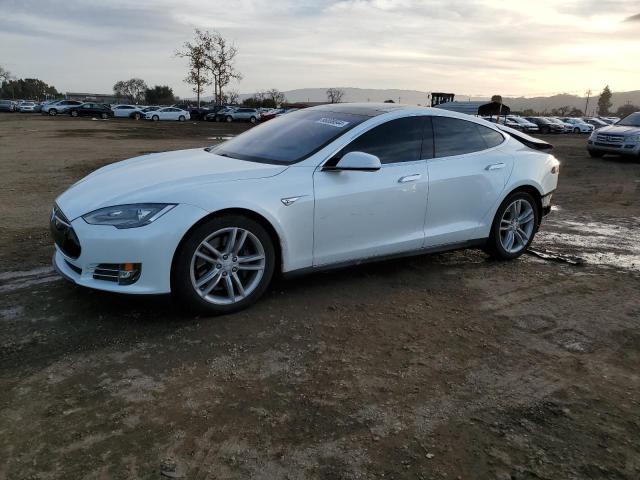 TESLA MODEL S 2013 with VIN 5YJSA1AC3DFP10215 - Photo from auction