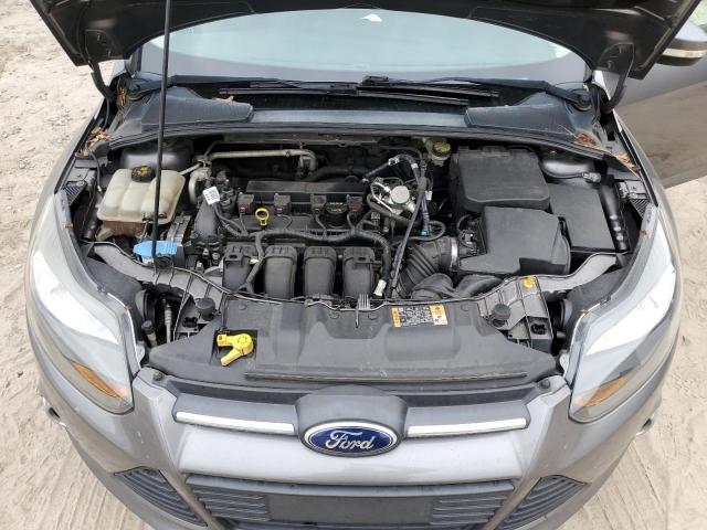 Photo 11 from auction – 2014 FORD FOCUS SE with VIN 1FADP3F20EL330899