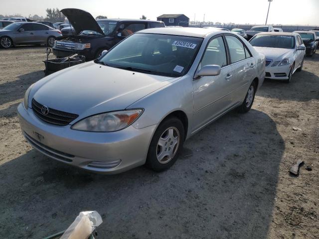 TOYOTA CAMRY LE 2002 with VIN JTDBE32K520046078 - Photo from auction