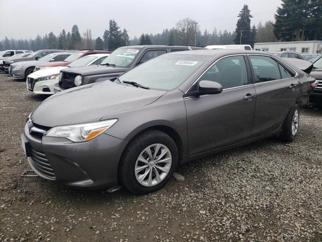 TOYOTA CAMRY LE 2016 with VIN 4T4BF1FK6GR565556 - Photo from auction