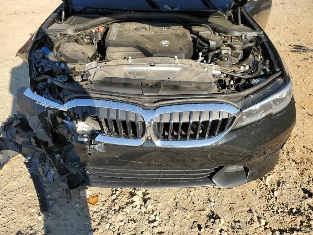 Photo 11 from auction – 2021 BMW 330I with VIN 3MW5R1J09M8C17152