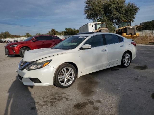 NISSAN ALTIMA 3.5 2016 with VIN 1N4BL3AP4GC150544 - Photo from auction
