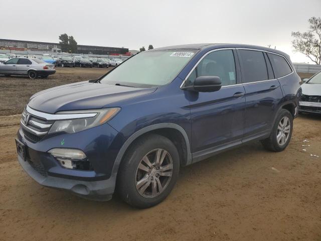 HONDA PILOT LX 2016 with VIN 5FNYF6H13GB093819 - Photo from auction