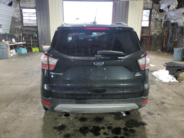 Photo 6 from auction – 2018 FORD ESCAPE SE with VIN 1FMCU9GDXJUC37504