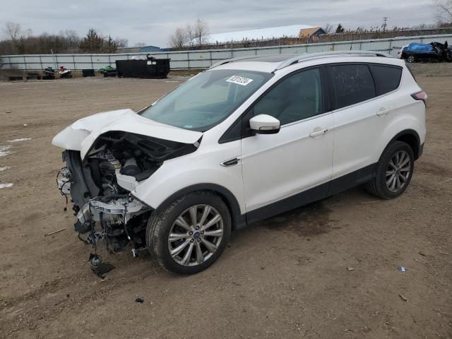 FORD ESCAPE TIT 2017 with VIN 1FMCU9JD1HUB12023 - Photo from auction