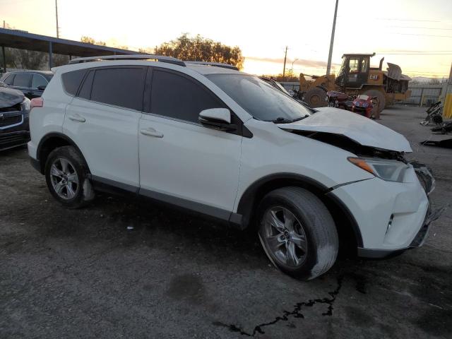 Photo 4 from auction – 2016 TOYOTA RAV4 XLE with VIN JTMWFREV9GJ092375