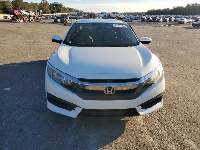 Photo 5 from auction – 2017 HONDA CIVIC EX with VIN 19XFC2F71HE082602