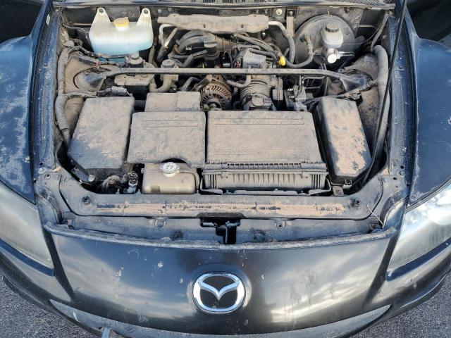 Photo 11 from auction – 2009 MAZDA RX8 with VIN JM1FE17P390402905