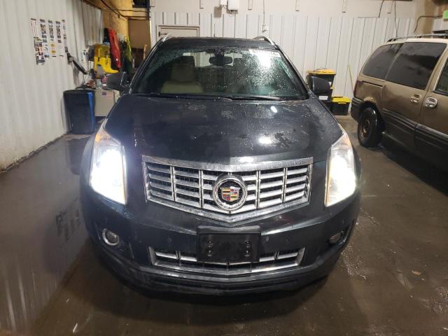 Photo 5 from auction – 2014 CADILLAC SRX LUXURY with VIN 3GYFNEE39ES631190