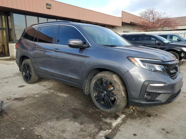 Photo 4 from auction – 2022 HONDA PILOT SE with VIN 5FNYF6H2XNB064971