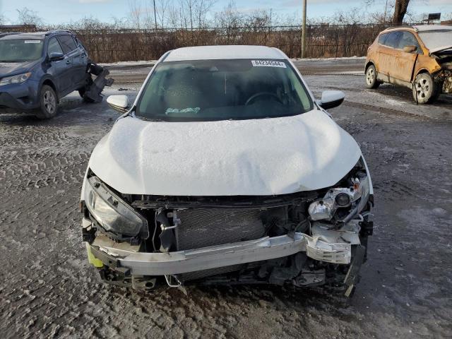 Photo 5 from auction – 2021 HONDA CIVIC LX with VIN 2HGFC2F53MH013201