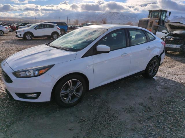 FORD FOCUS SE 2018 with VIN 1FADP3FE8JL223555 - Photo from auction