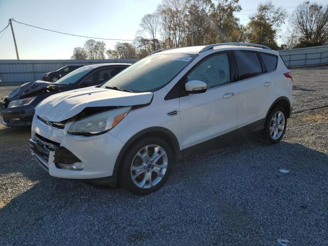 FORD ESCAPE TIT 2016 with VIN 1FMCU9JX6GUC32778 - Photo from auction