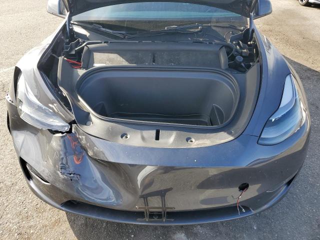 Photo 11 from auction – 2023 TESLA MODEL Y with VIN 7SAYGDEF8PF890152