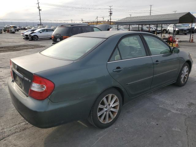 Photo 3 from auction – 2002 TOYOTA CAMRY LE with VIN JTDBE32K220135476