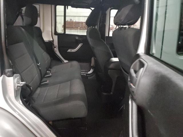 Photo 10 from auction – 2011 JEEP WRANGLER U with VIN 1J4HA5H12BL633055