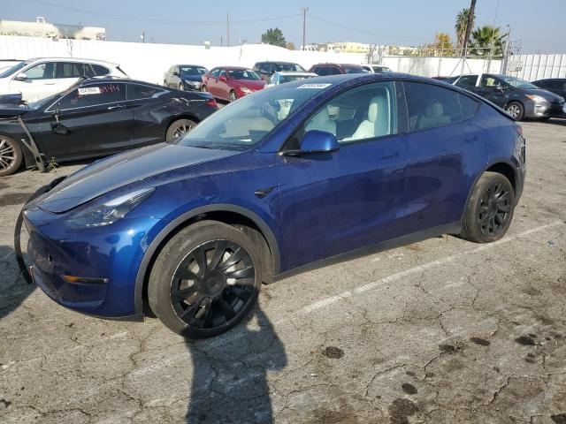 TESLA MODEL Y 2023 with VIN 7SAYGAEE1PF868029 - Photo from auction