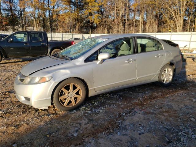 HONDA CIVIC LX 2011 with VIN 2HGFA1F59BH532587 - Photo from auction