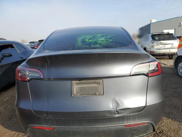 Photo 6 from auction – 2023 TESLA MODEL Y with VIN 7SAYGAEE2PF910062