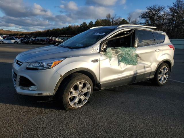 FORD ESCAPE TIT 2016 with VIN 1FMCU0JX1GUA32919 - Photo from auction
