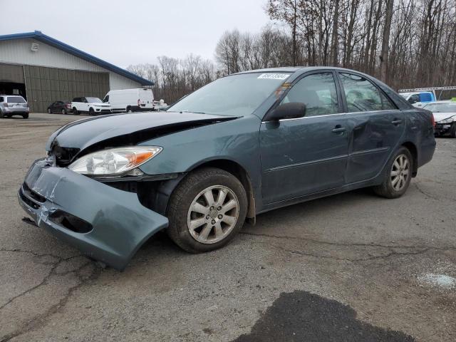 TOYOTA CAMRY LE 2003 with VIN 4T1BE30K93U734190 - Photo from auction