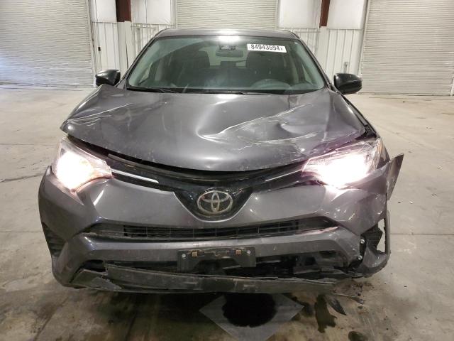 Photo 5 from auction – 2018 TOYOTA RAV4 LE with VIN JTMBFREV1JJ181041