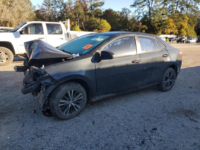 TOYOTA COROLLA L 2016 with VIN 5YFBURHE2GP521982 - Photo from auction
