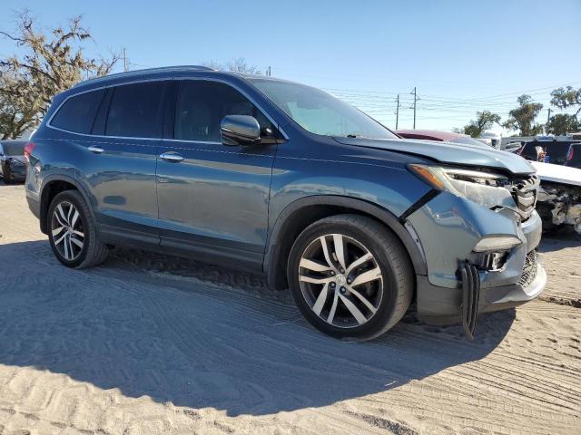 Photo 4 from auction – 2017 HONDA PILOT TOUR with VIN 5FNYF5H91HB034415