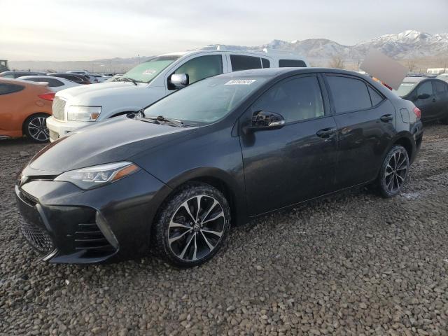 TOYOTA COROLLA L 2017 with VIN 2T1BURHE3HC874085 - Photo from auction