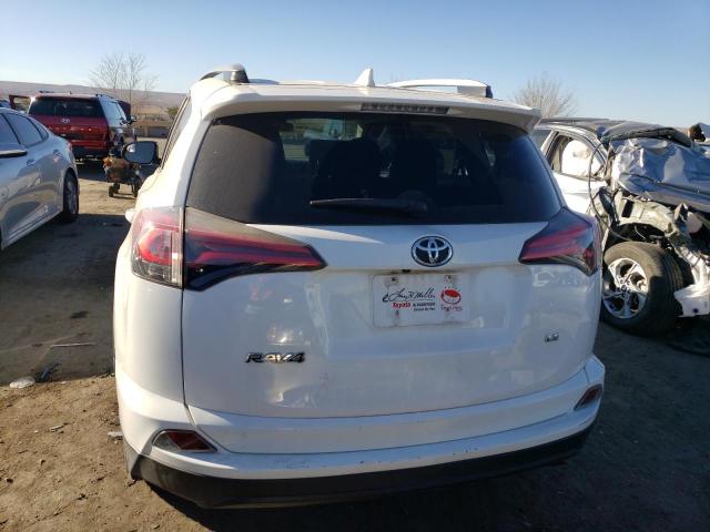 Photo 6 from auction – 2018 TOYOTA RAV4 LE with VIN JTMZFREV1JJ168093