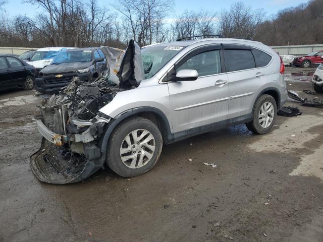 HONDA CR-V EX 2015 with VIN 2HKRM4H55FH642437 - Photo from auction