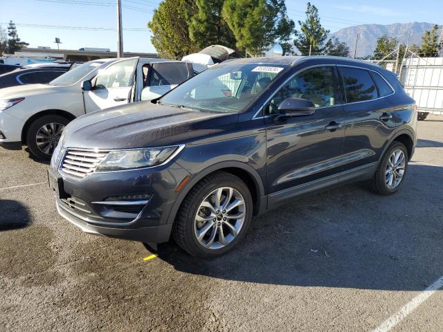 LINCOLN MKC 2015 with VIN 5LMCJ1A9XFUJ35879 - Photo from auction