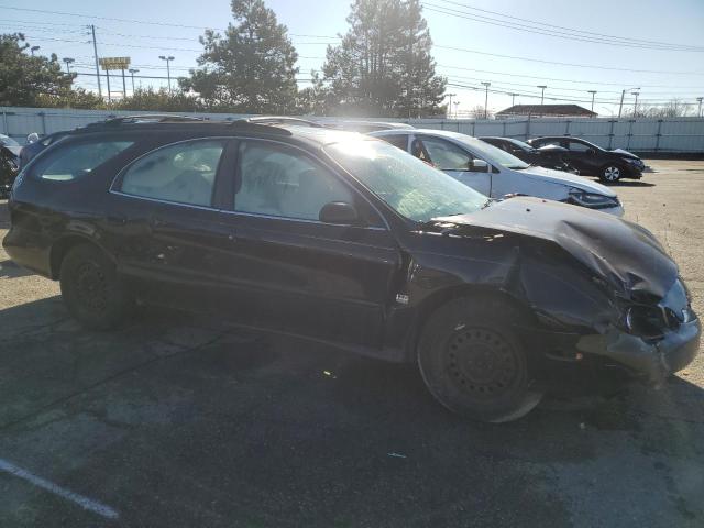 Photo 4 from auction – 1999 FORD TAURUS SE with VIN 1FAFP58SXXA234634