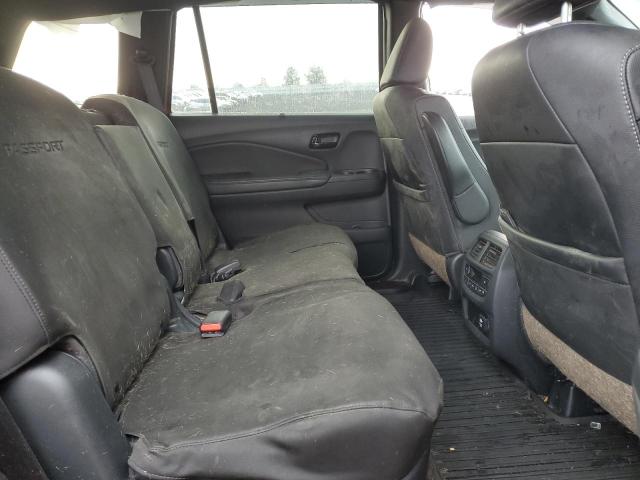 Photo 11 from auction – 2023 HONDA PASSPORT E with VIN 5FNYF8H09PB016410