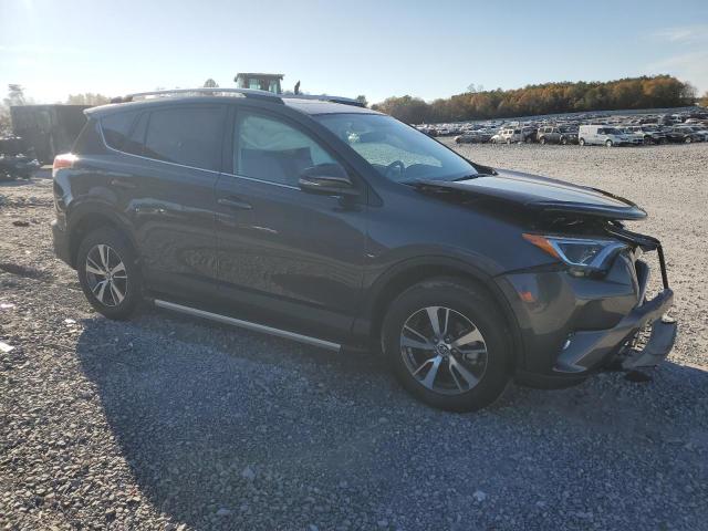 Photo 4 from auction – 2016 TOYOTA RAV4 XLE with VIN 2T3RFREV4GW487983