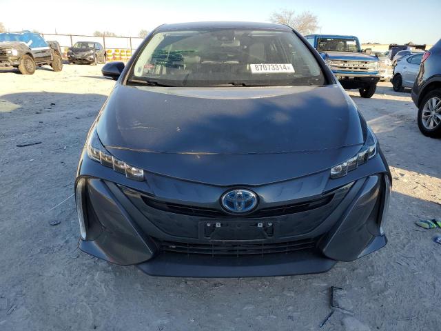 Photo 5 from auction – 2022 TOYOTA PRIUS PRIM with VIN JTDKAMFP3N3200362