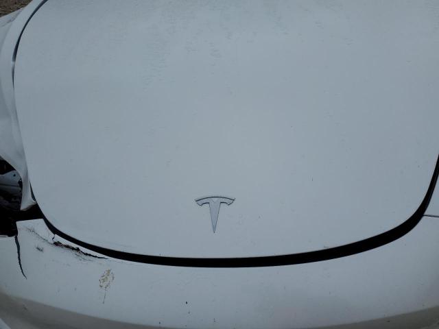 Photo 11 from auction – 2021 TESLA MODEL 3 with VIN 5YJ3E1EB9MF085412