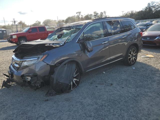 HONDA PILOT ELIT 2019 with VIN 5FNYF6H02KB080608 - Photo from auction