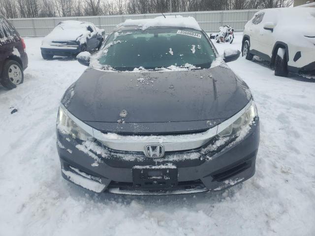 Photo 5 from auction – 2016 HONDA CIVIC LX with VIN 2HGFC2F54GH509922