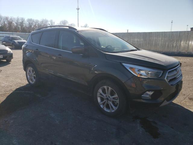 Photo 4 from auction – 2018 FORD ESCAPE SE with VIN 1FMCU9GD0JUA38557