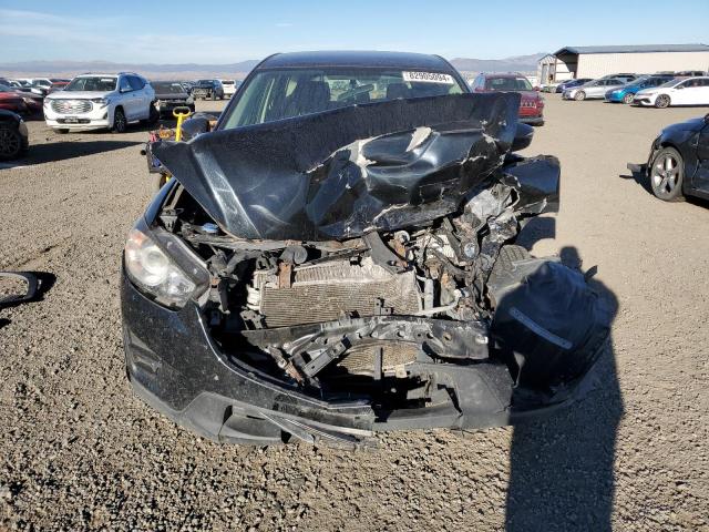Photo 5 from auction – 2016 MAZDA CX-5 SPORT with VIN JM3KE4BY5G0635947