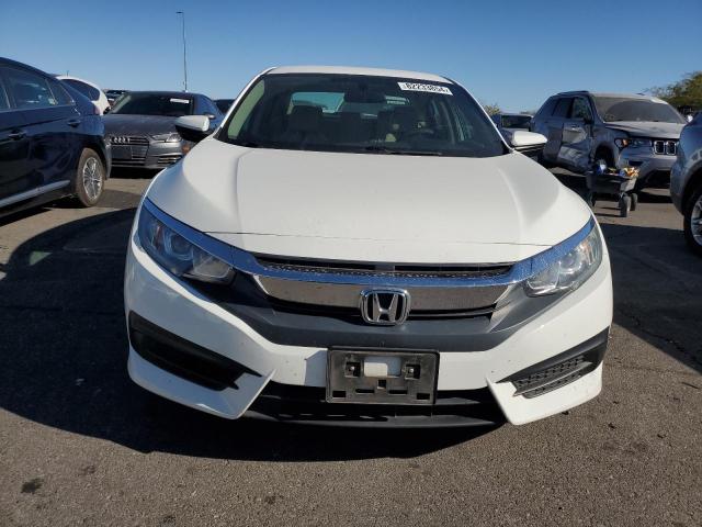 Photo 5 from auction – 2018 HONDA CIVIC LX with VIN 19XFC2F50JE020869