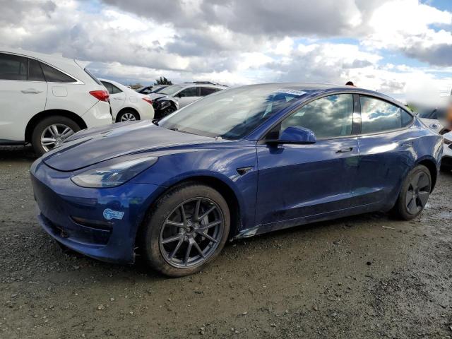 TESLA MODEL 3 2021 with VIN 5YJ3E1EBXMF999054 - Photo from auction