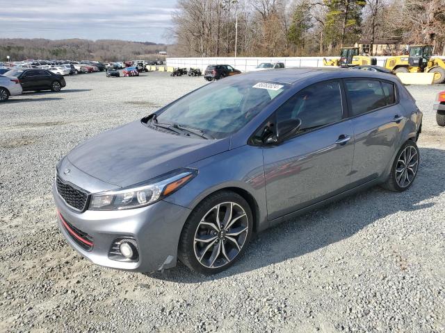 KIA FORTE EX 2017 with VIN 3KPFN5A39HE155571 - Photo from auction